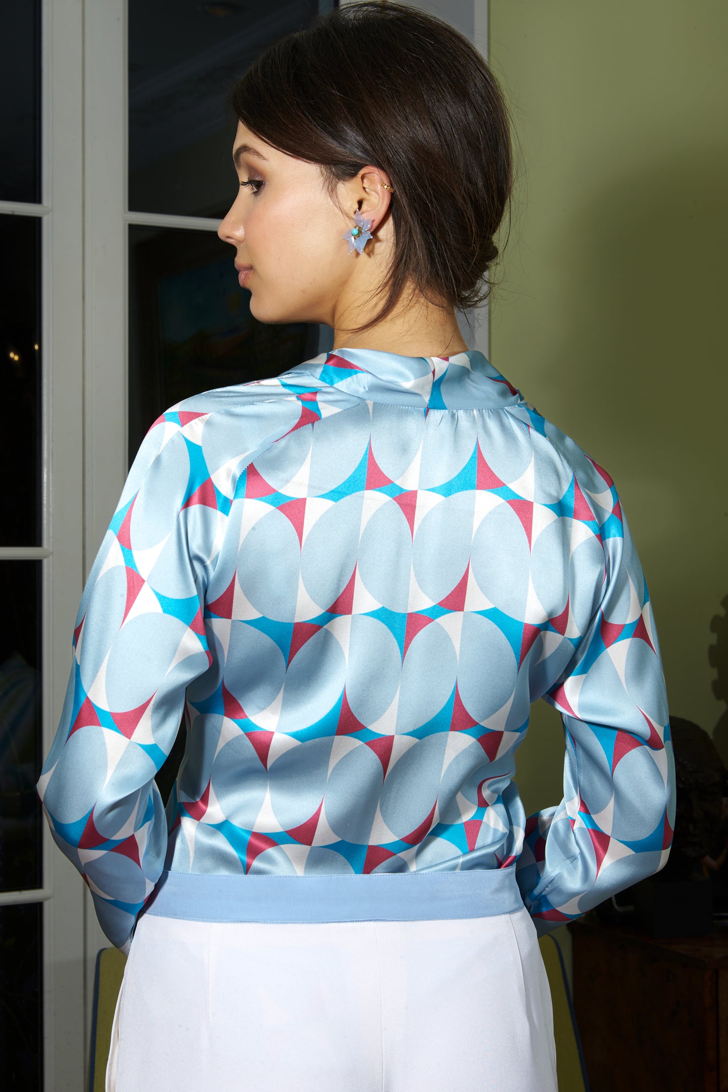 Cross fronted blue and pink satin blouse